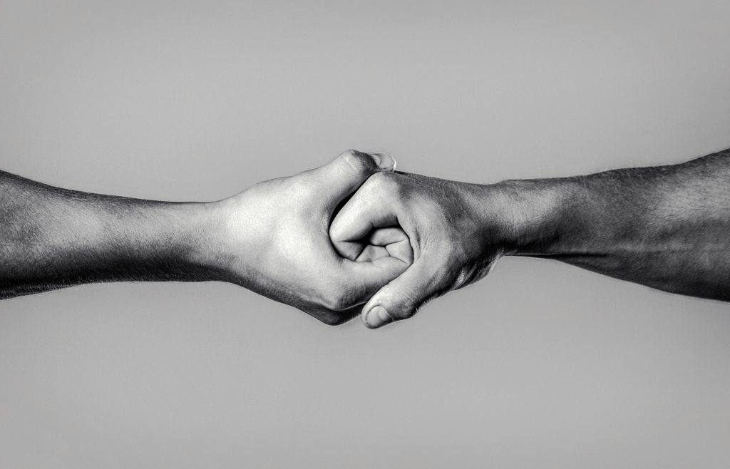 Two,Hands,,Isolated,Arm,,Helping,Hand,Of,A,Friend.,Rescue,